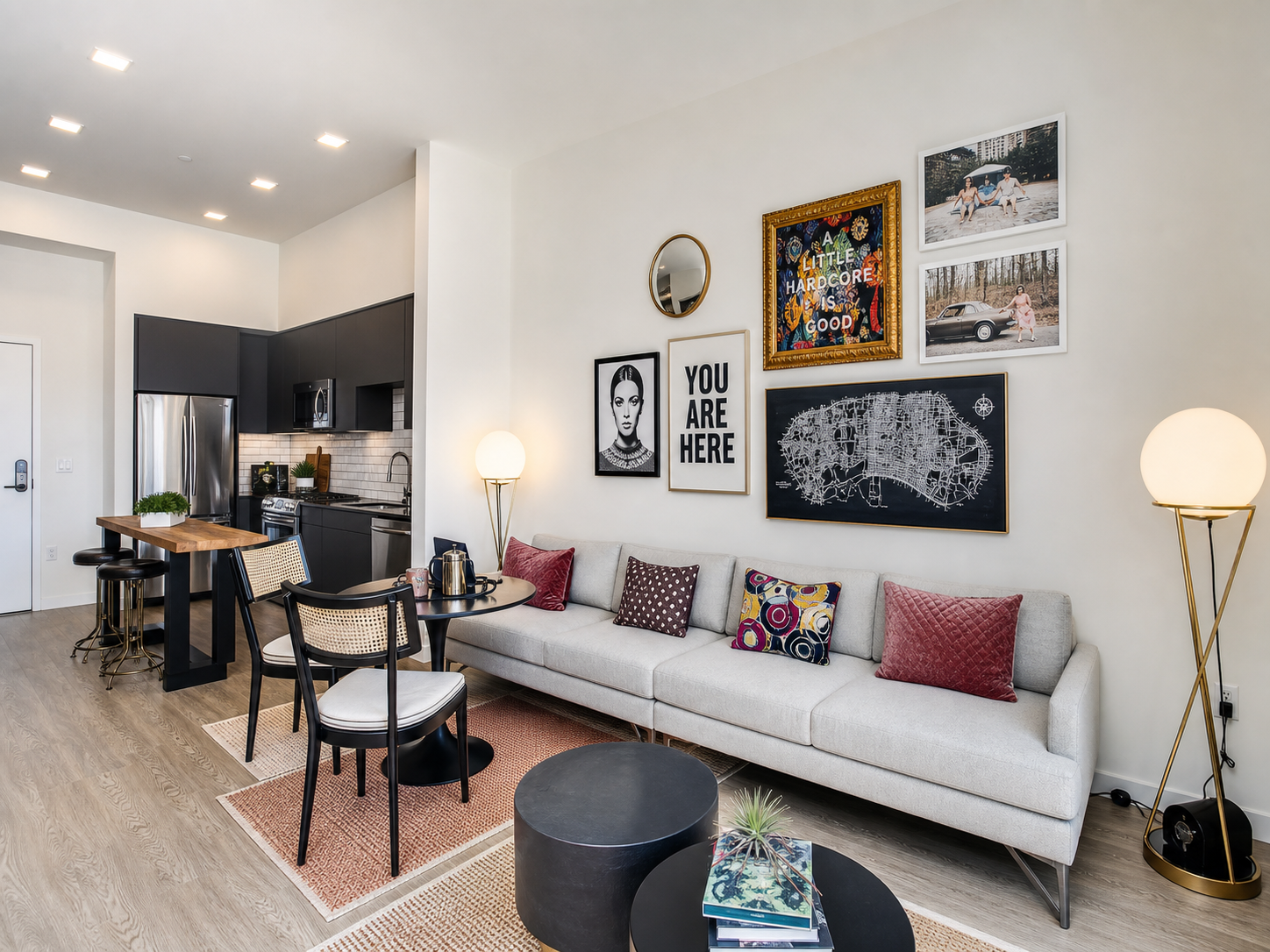 Oceanaire model residence — living room with gallery wall